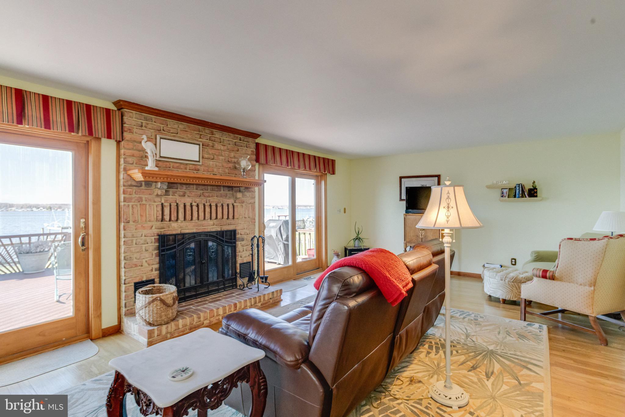 1452 Galena Road Baltimore, MD 21221 - Photo 22 of 80 a living room with furniture and a fireplace