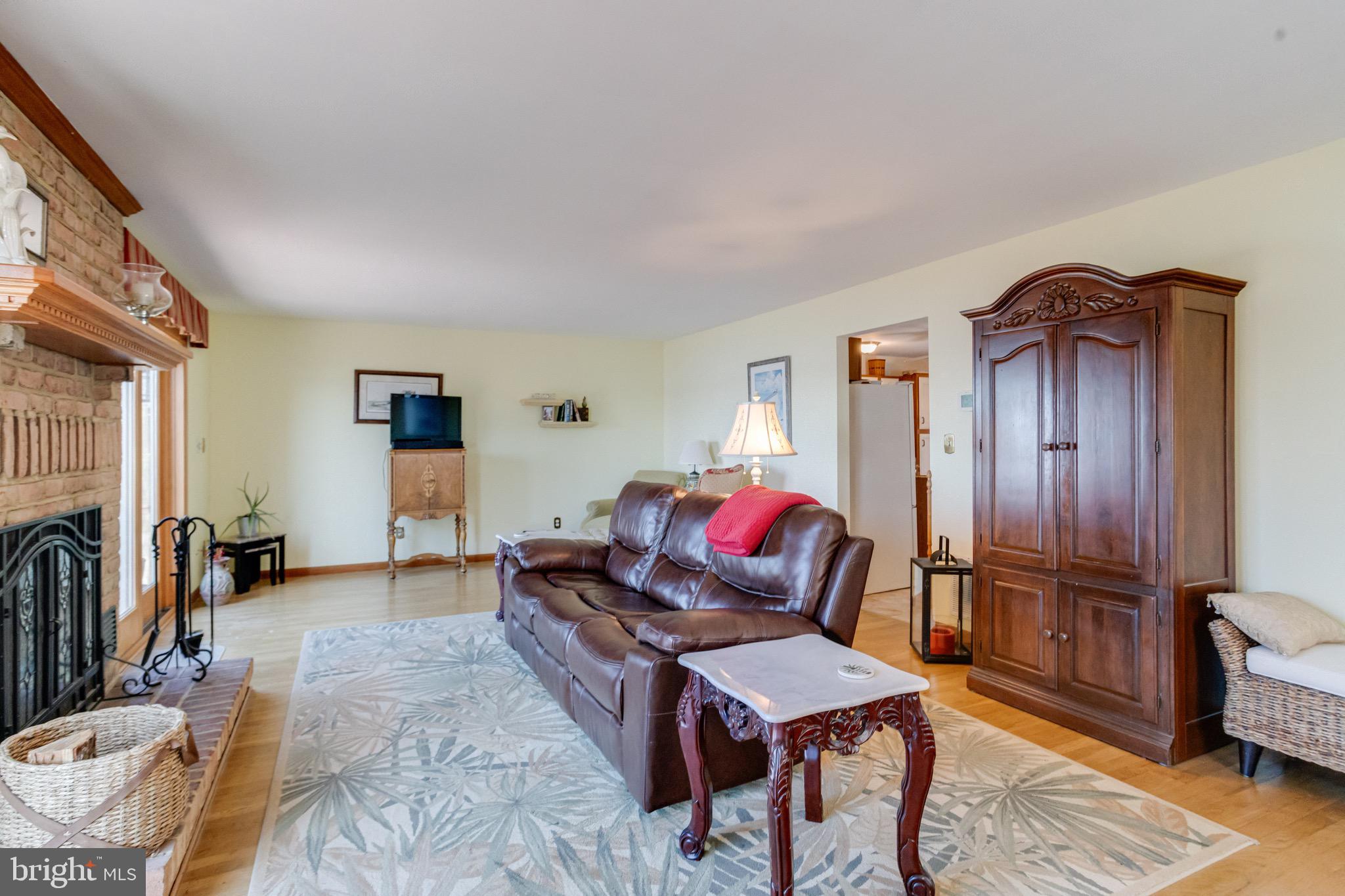 1452 Galena Road Baltimore, MD 21221 - Photo 24 of 80 a living room with furniture a rug and a window
