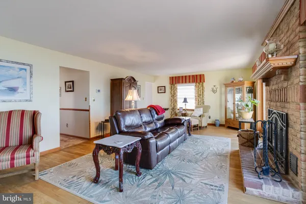 a bedroom with a large bed and a large window