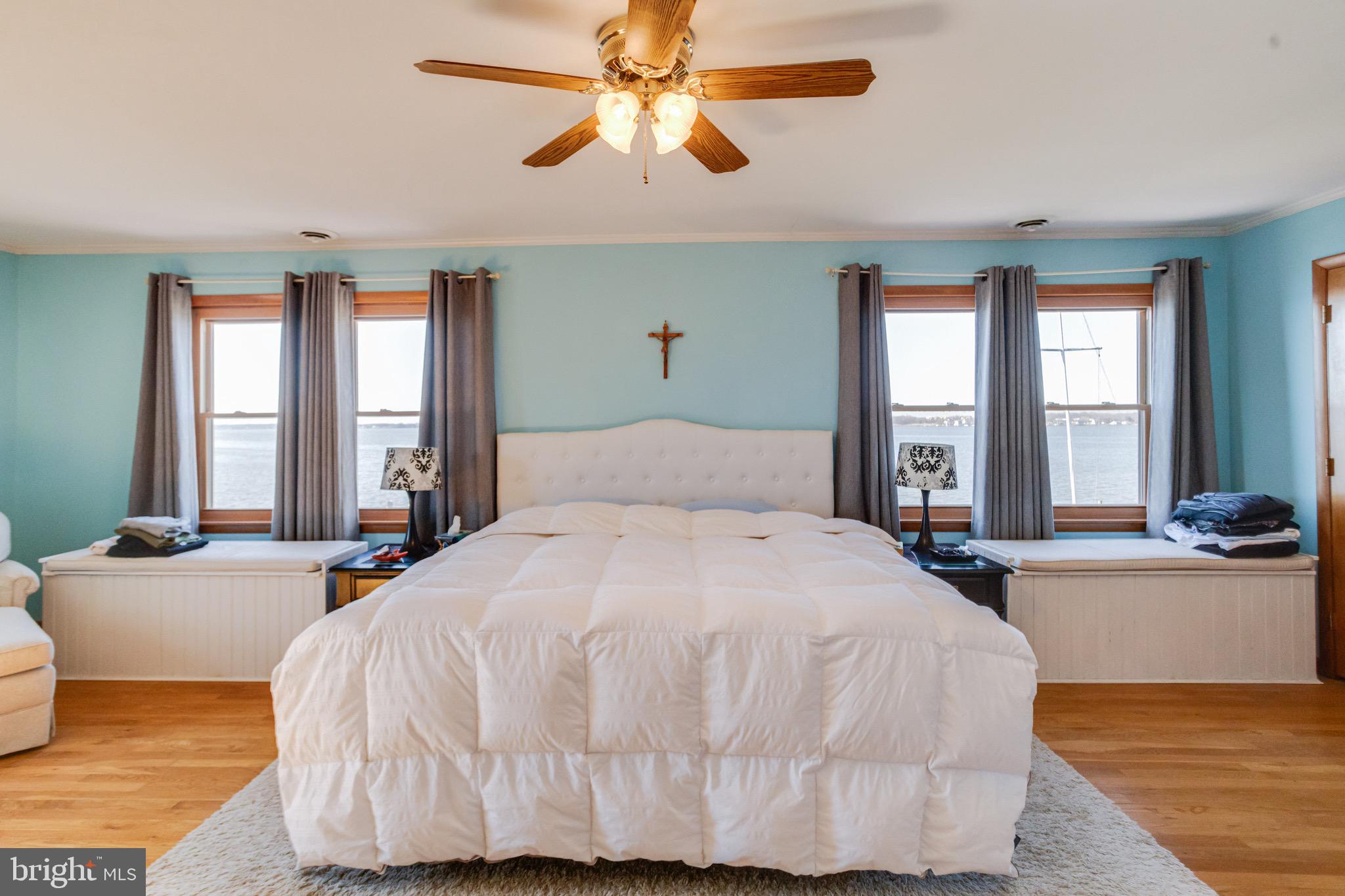 1452 Galena Road Baltimore, MD 21221 - Photo 33 of 80 a bedroom with a large bed and a large window