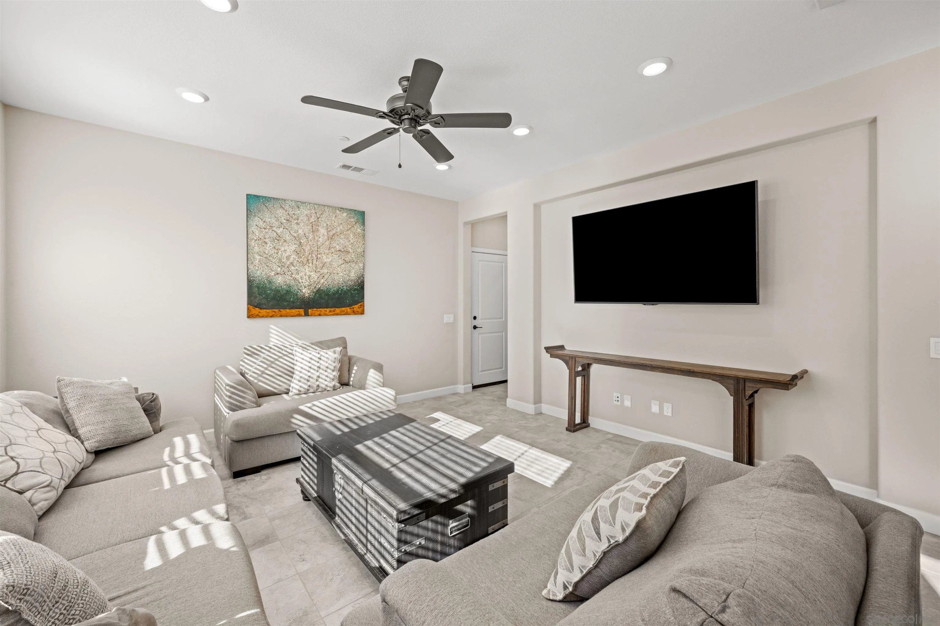 1151 Delpy View Point Vista, CA 92084 - Photo 11 of 44 a living room with furniture and a flat screen tv