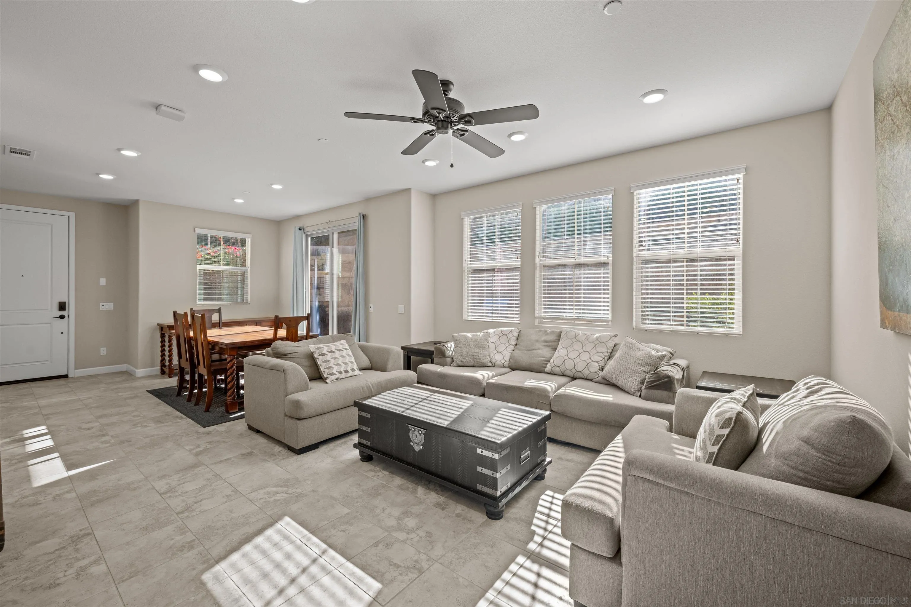 1151 Delpy View Point Vista, CA 92084 - Photo 12 of 44 a living room with furniture and a large window