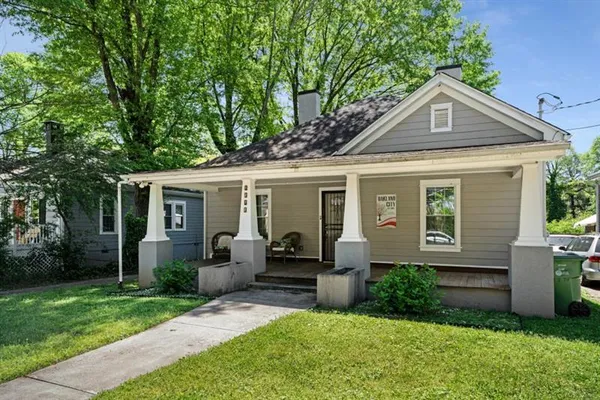 front view of a house with a yard
