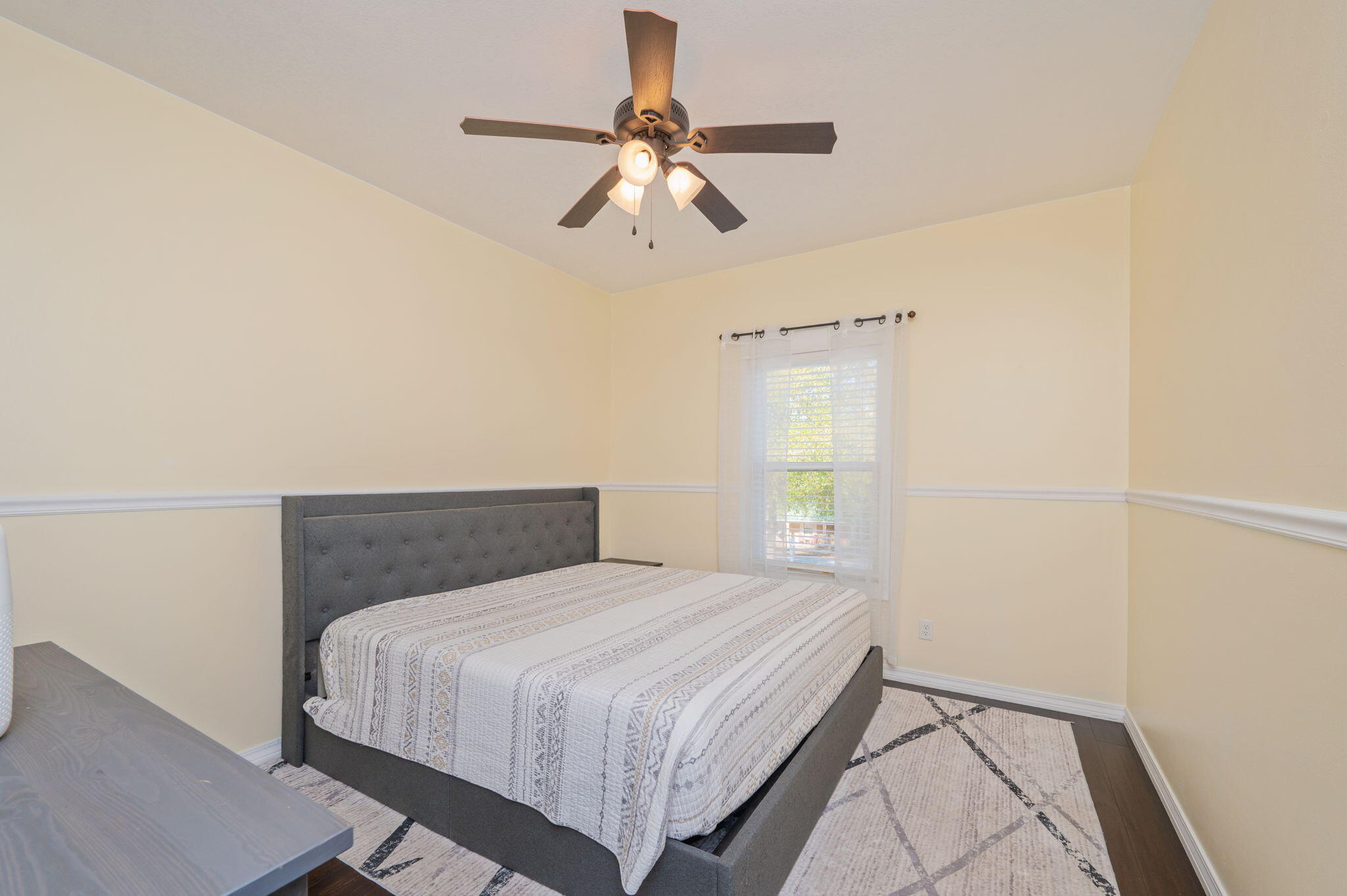 5777 Wildwood Road Crestview, FL 32536 - Photo 23 of 68 a bedroom with a bed and window