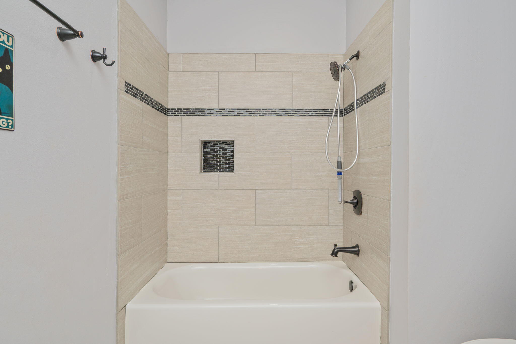 5777 Wildwood Road Crestview, FL 32536 - Photo 35 of 68 a bathroom with a shower and a bath tub