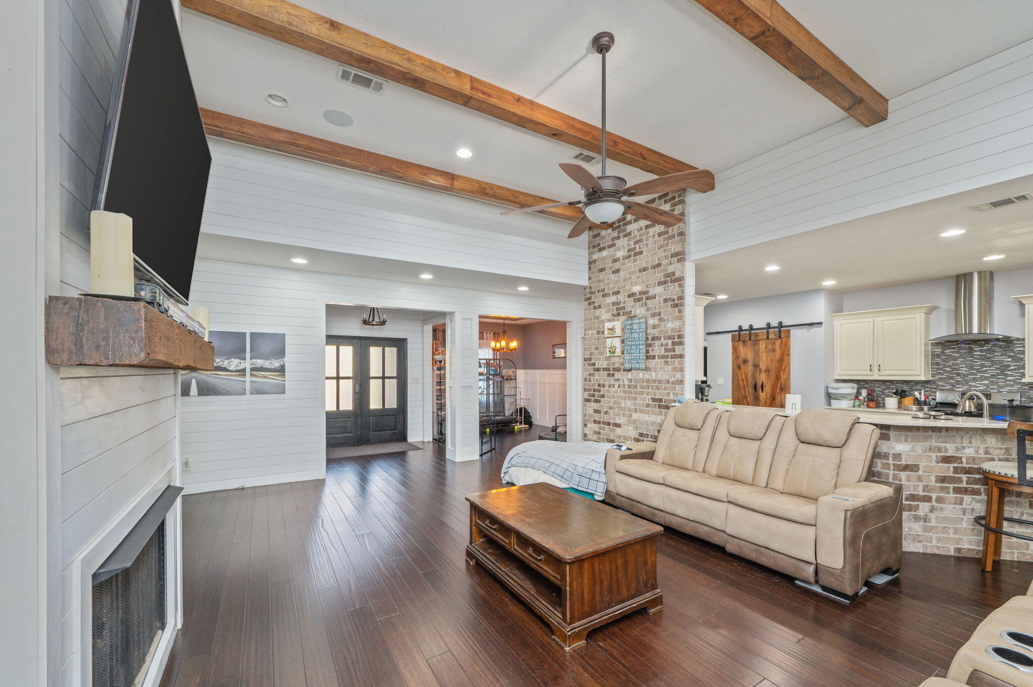 5777 Wildwood Road Crestview, FL 32536 - Photo 10 of 68 a living room with furniture and a fireplace