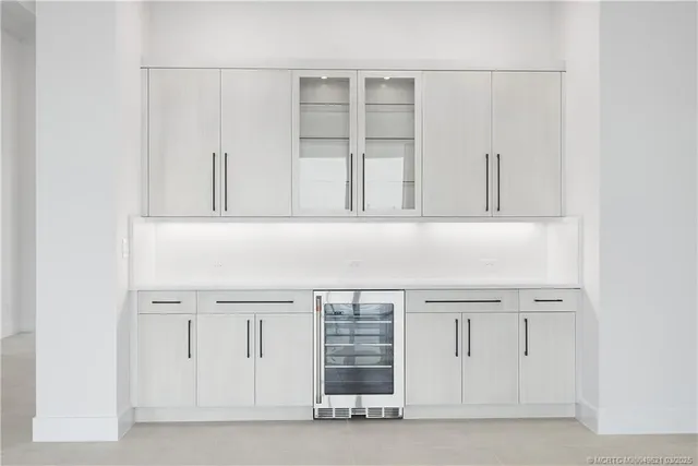 a view of an empty room with a sink