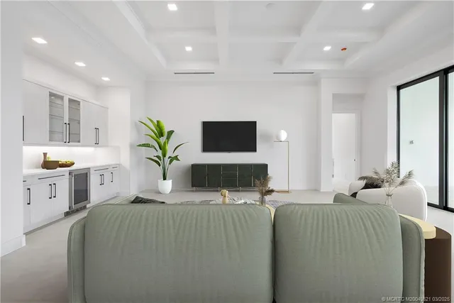 a view of an empty room with a fireplace and a window