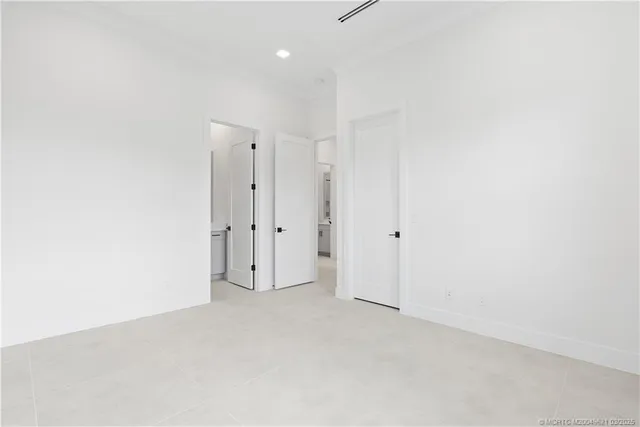 a view of a swimming pool and lake from a window