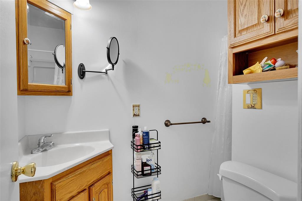 330 South Cypress Road, Unit 610 Pompano Beach, FL 33060 - Photo 17 of 35 a bathroom with a sink a toilet and shower