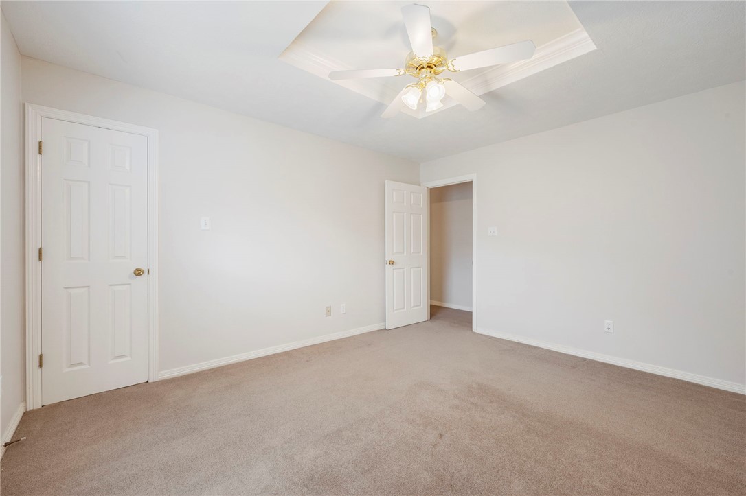 713 Willow Loop College Station, TX 77845 - Photo 25 of 39 a view of an empty room with a chandelier fan