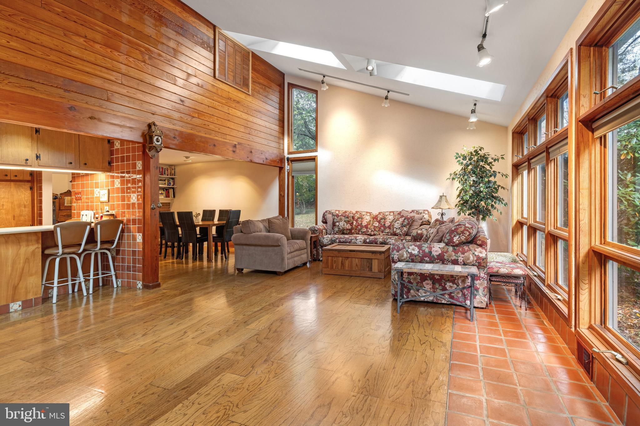 2390 Terwood Road Huntingdon Valley, PA 19006 - Photo 11 of 36 a living room with lots of furniture and a wooden floor