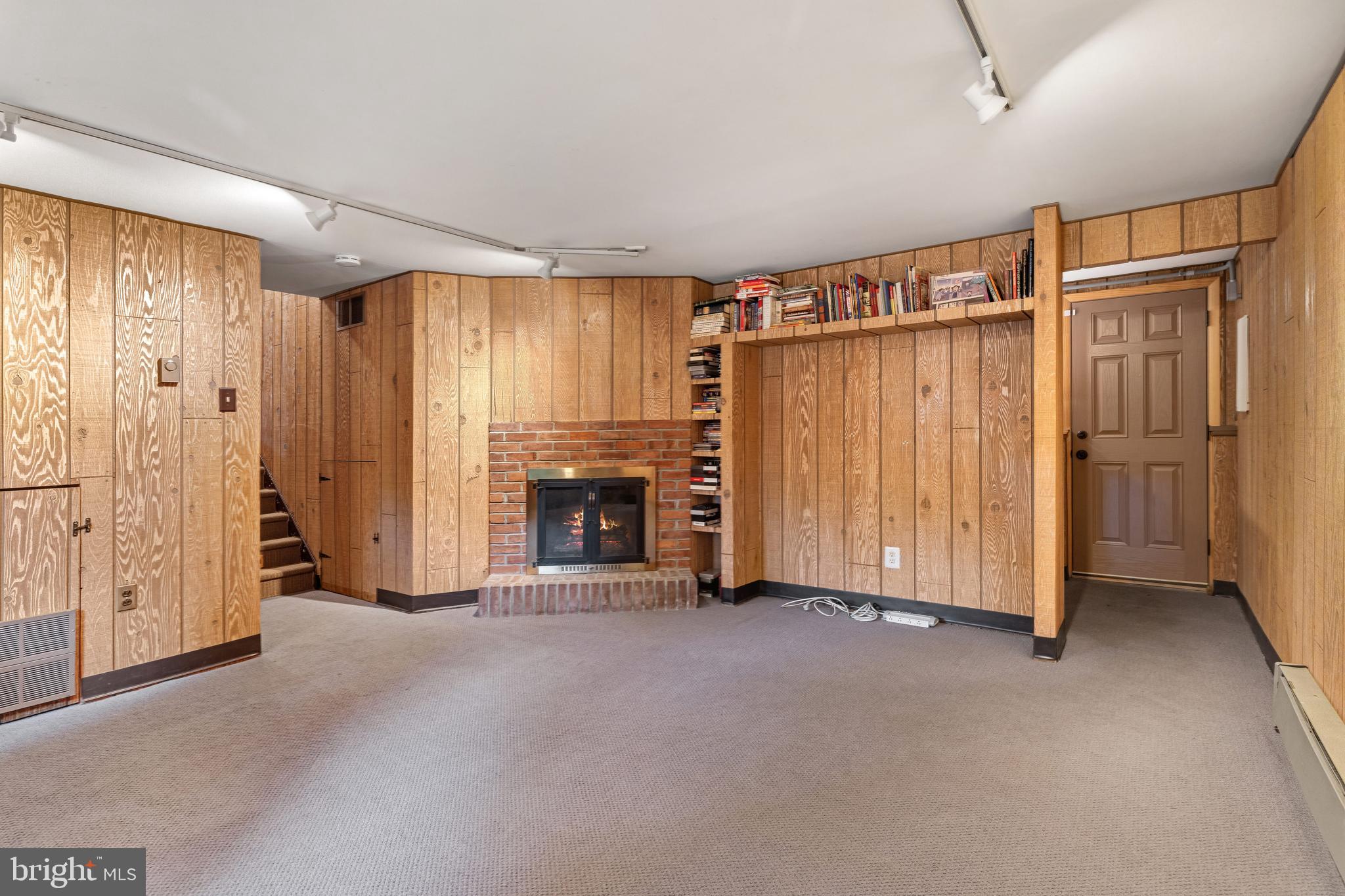 2390 Terwood Road Huntingdon Valley, PA 19006 - Photo 16 of 36 a view of a livingroom with an empty space and a fireplace