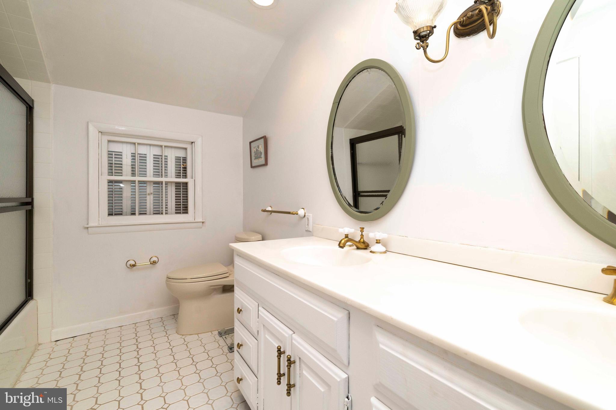 2390 Terwood Road Huntingdon Valley, PA 19006 - Photo 24 of 36 a bathroom with a sink and a mirror