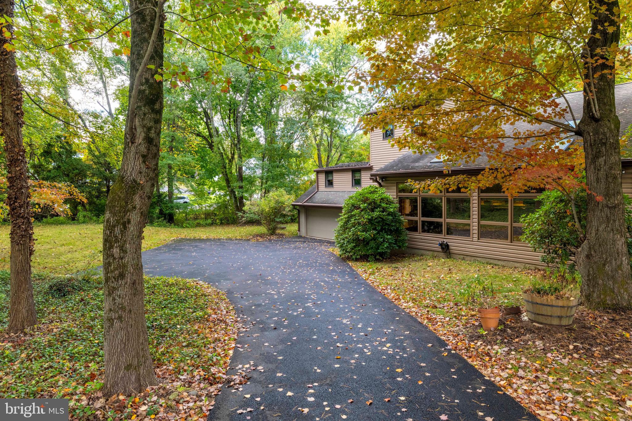 2390 Terwood Road Huntingdon Valley, PA 19006 - Photo 29 of 36 a front view of a house with garden