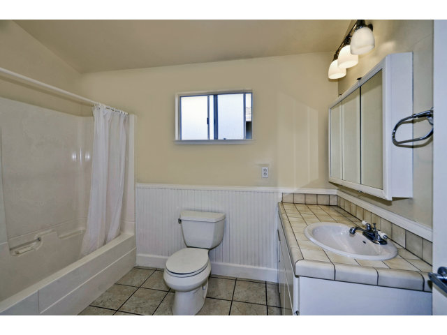 111 Hames Road Corralitos, CA 95076 - Photo 11 of 25 a bathroom with a toilet sink shower and mirror