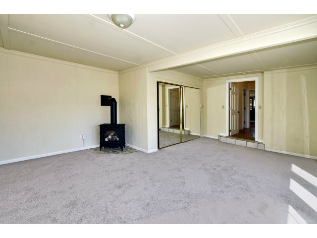 111 Hames Road Corralitos, CA 95076 - Photo 13 of 25 a view of an empty room with workspace and a window
