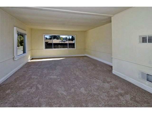111 Hames Road Corralitos, CA 95076 - Photo 6 of 25 a view of an empty room with a window