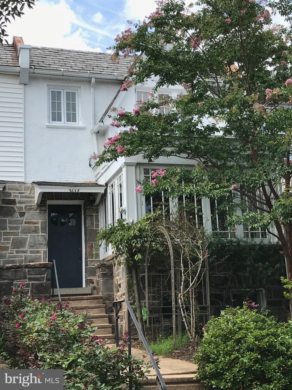 3628 Rexmere Road Baltimore, MD 21218 - Photo 1 of 28 a house with a tree in front of it