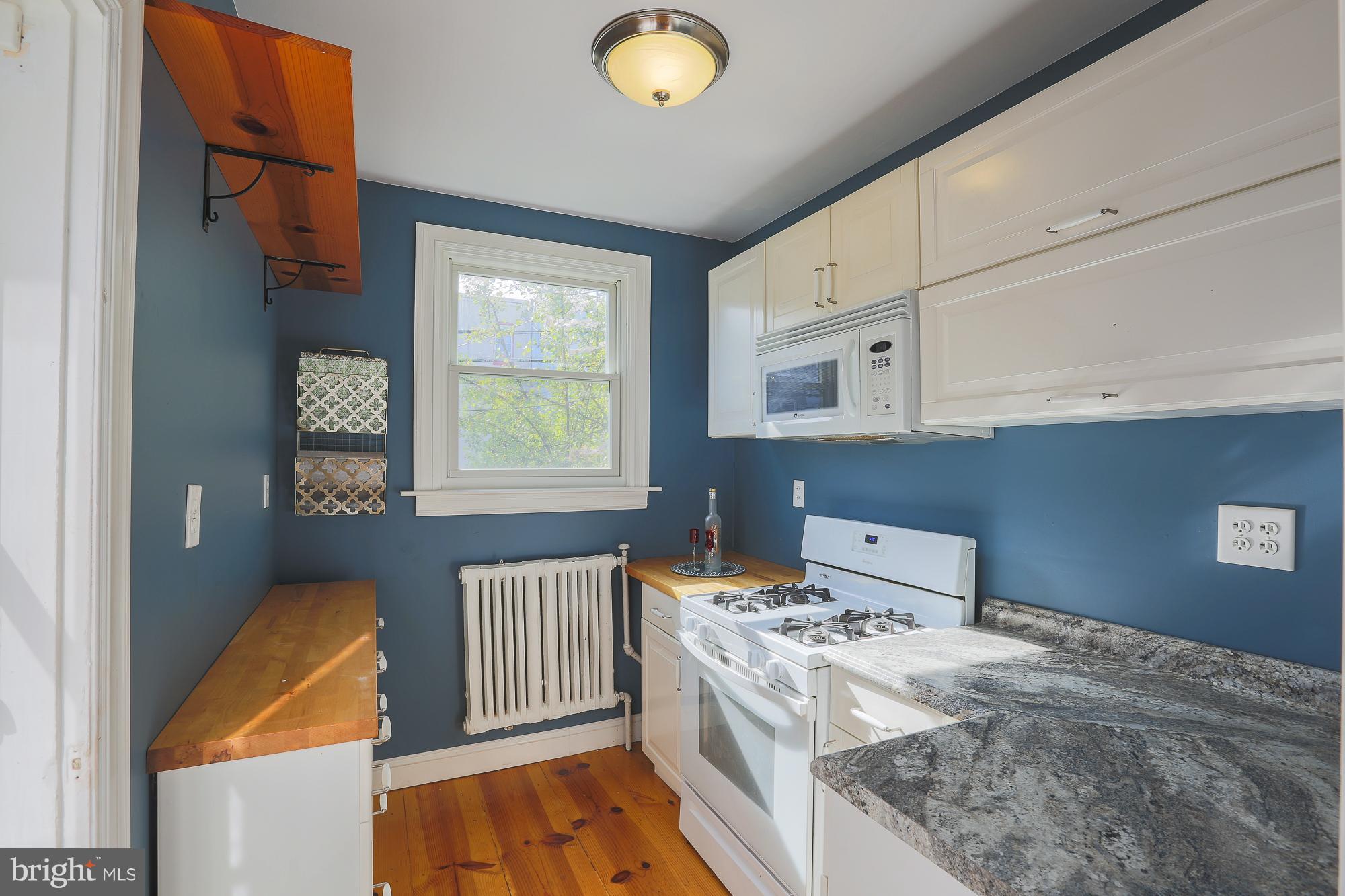 3628 Rexmere Road Baltimore, MD 21218 - Photo 16 of 28 a bedroom with a bed and a window