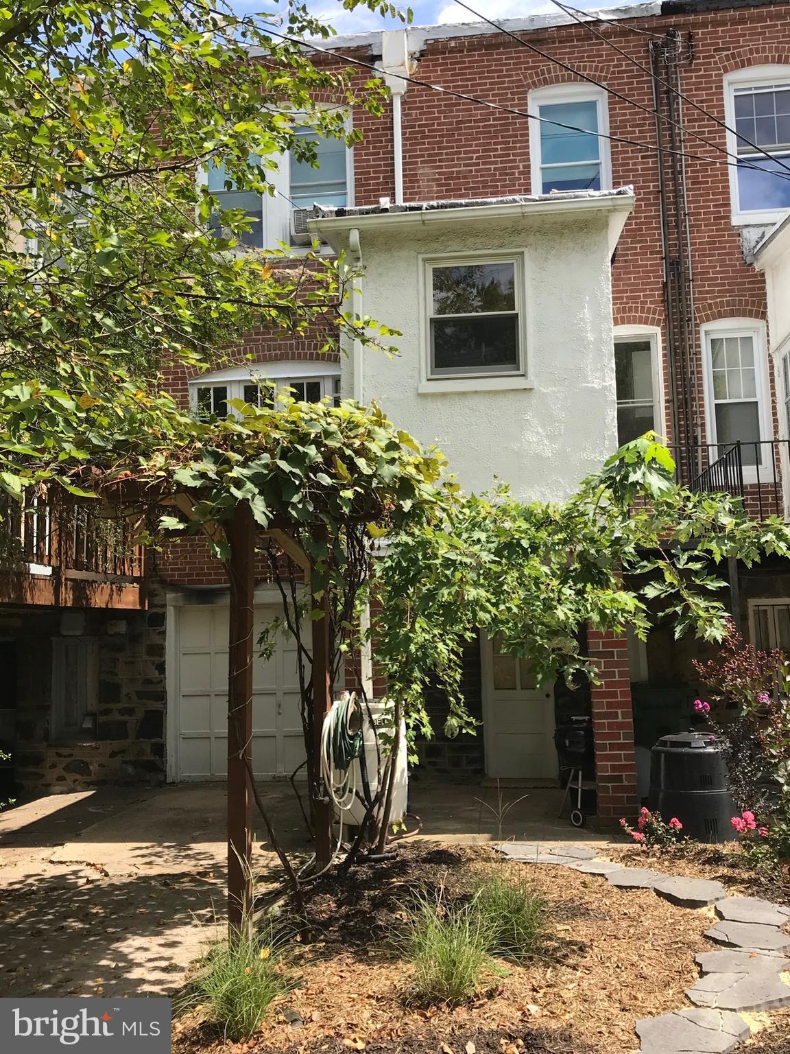 3628 Rexmere Road Baltimore, MD 21218 - Photo 27 of 28 a front view of a house with a yard