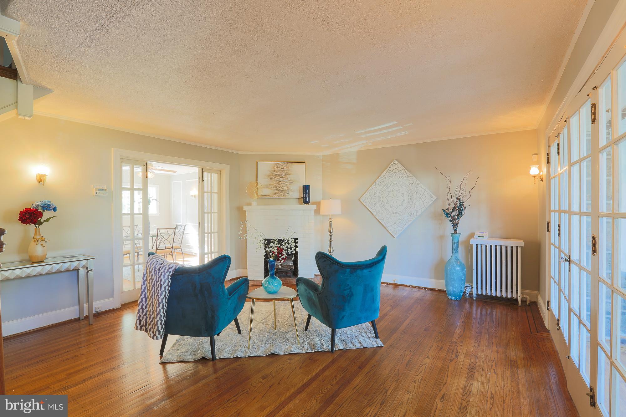 3628 Rexmere Road Baltimore, MD 21218 - Photo 4 of 28 a living room with furniture and a wooden floor