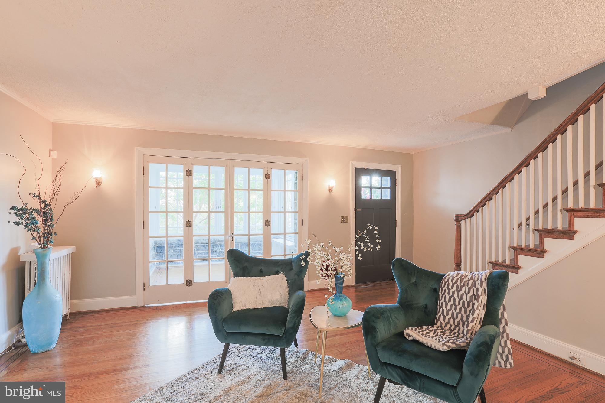 3628 Rexmere Road Baltimore, MD 21218 - Photo 5 of 28 a living room with furniture and wooden floor