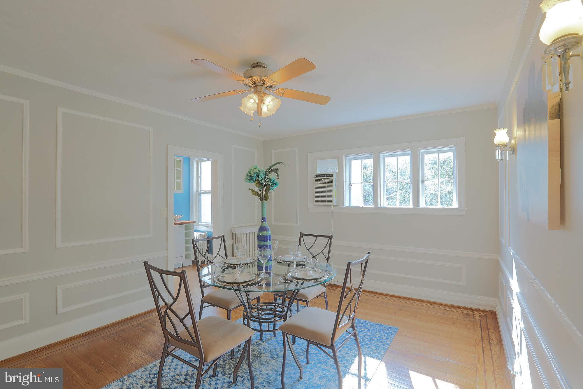 3628 Rexmere Road Baltimore, MD 21218 - Photo 10 of 28 a view of a dining room with furniture and window