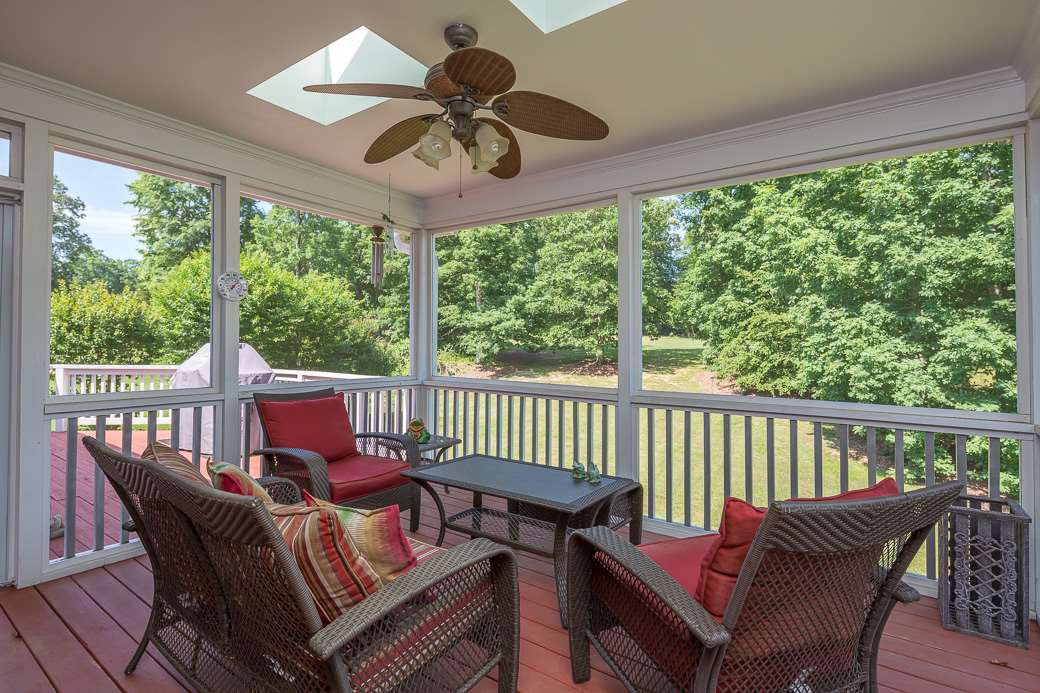 3004 Cascadia Drive Raleigh, NC 27610 - Photo 25 of 25 Screened porch has skylights & a ceiling fan to keep you cool. Access the deck from the screened porch or master bedroom... Screened Porch