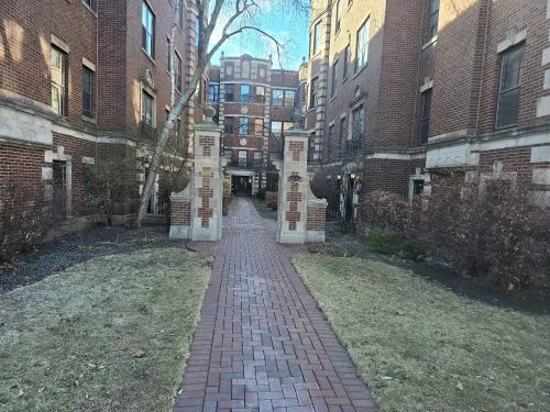 a view of a pathway both side of building