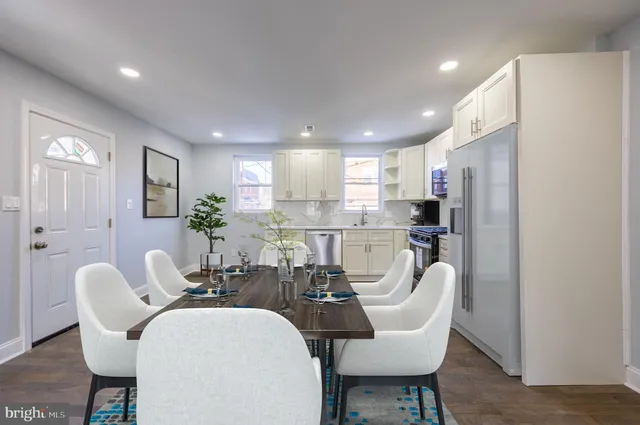 a view of a dining room with furniture
