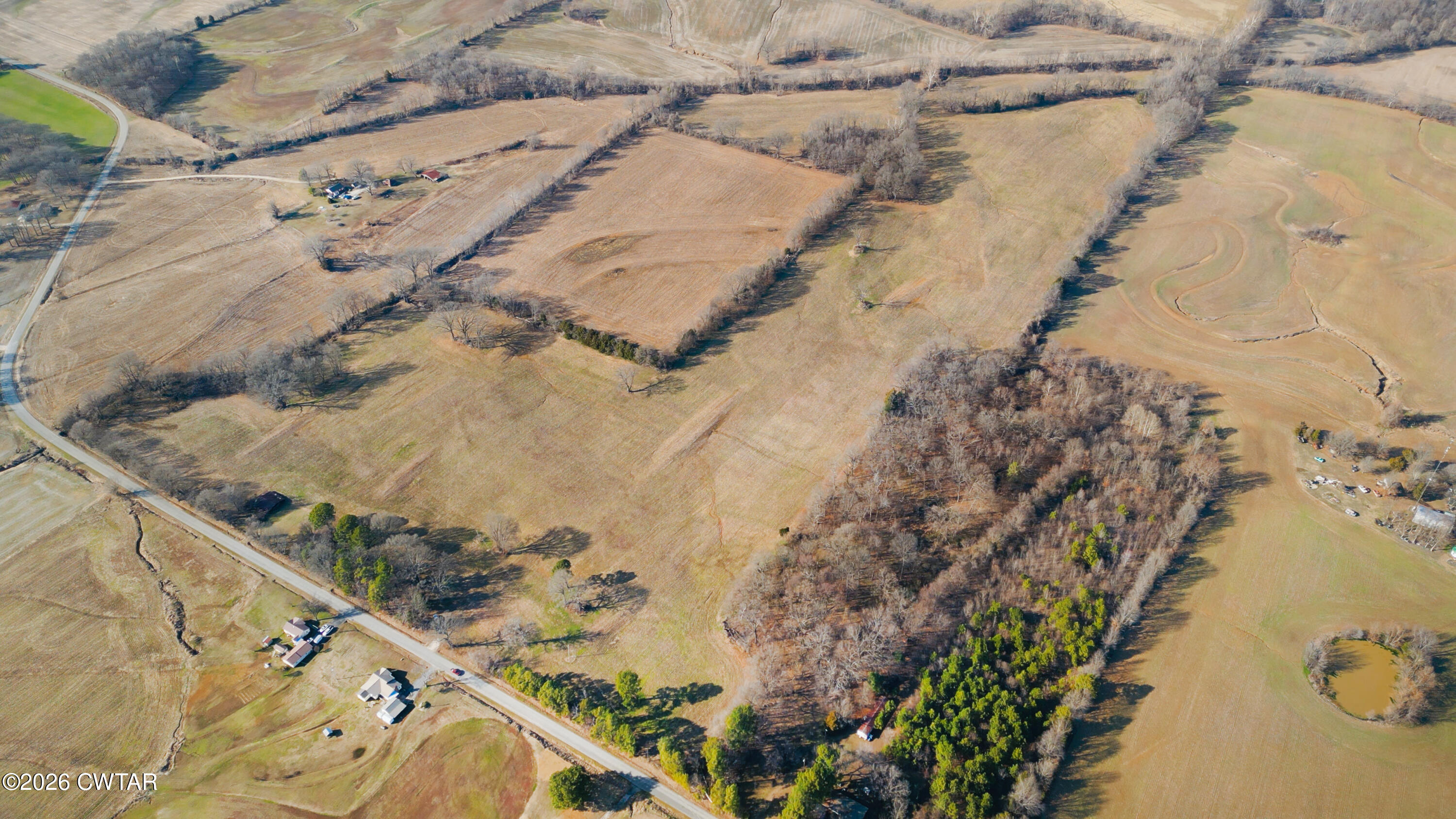 180 Brazil Fruitland Road Humboldt, TN 38343 - Photo 6 of 26 a view of a backyard of the house