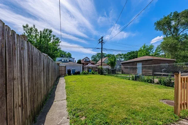 a view of a backyard with plants