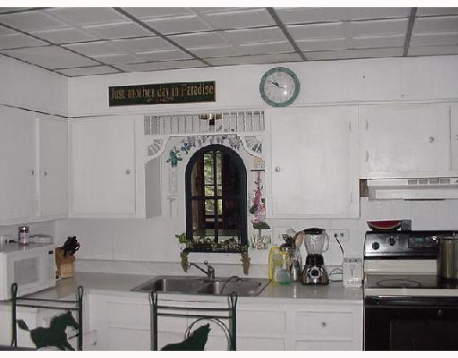 184 Profio Road McDonald, PA 15057 - Photo 2 of 8 Kitchen. Bright kitchen with access to a side porch...feed the birds, look at your beautiful property! Kitchen bar area for added seating too...