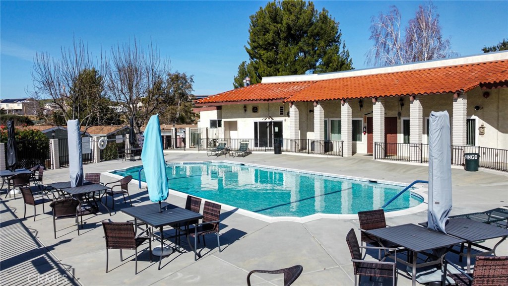 9443 Sharondale Road Calimesa, CA 92320 - Photo 2 of 22 a view of a patio with a table chairs and a table