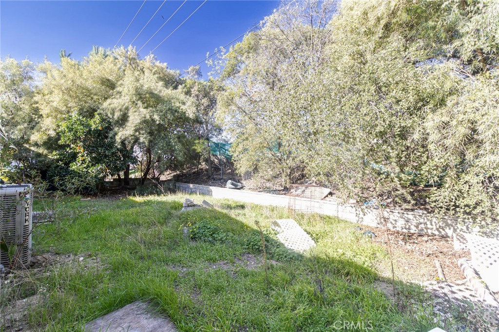 9443 Sharondale Road Calimesa, CA 92320 - Photo 7 of 22 a view of yard with tree