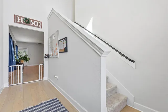 a view of a hallway with staircase
