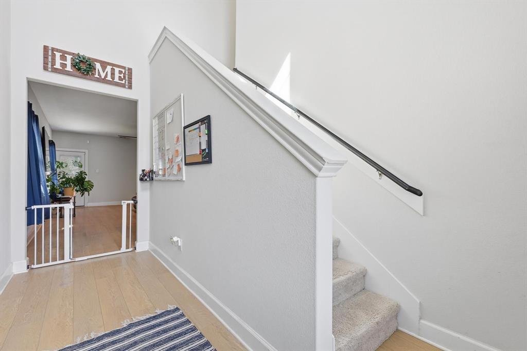 1334 Windemere Way Princeton, TX 75407 - Photo 16 of 31 a view of a hallway with staircase
