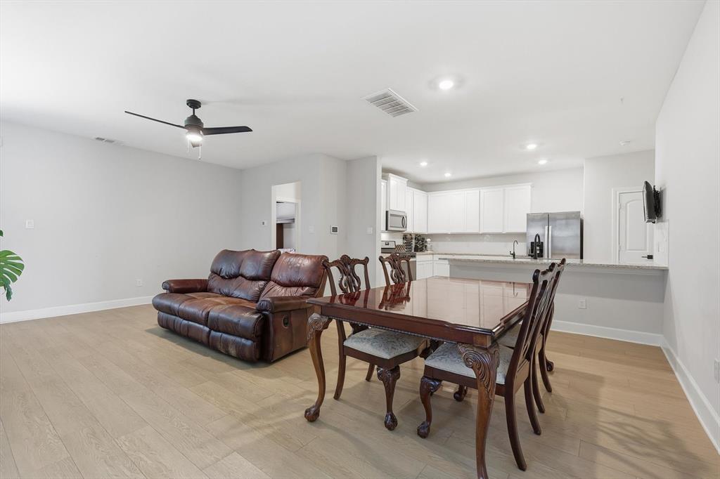 1334 Windemere Way Princeton, TX 75407 - Photo 2 of 31 a view of a dining room with furniture