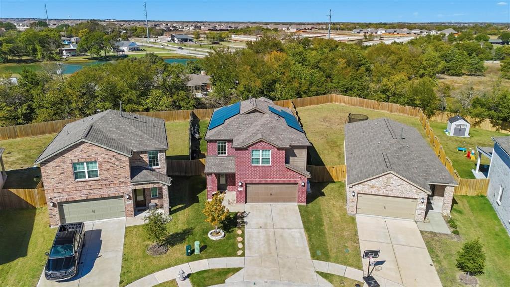 1334 Windemere Way Princeton, TX 75407 - Photo 25 of 31 an aerial view of a house with a garden