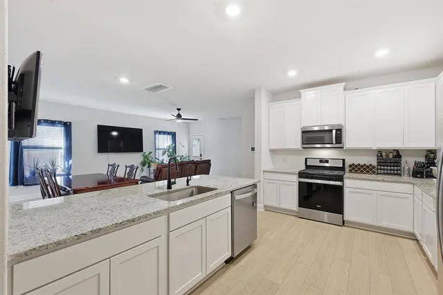 a view of a dining room with furniture