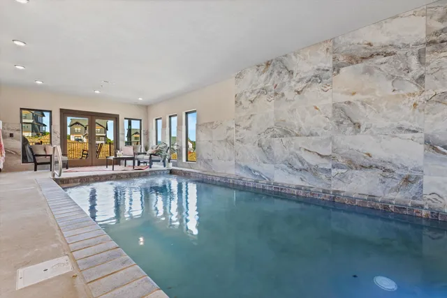 a view of a living room with a swimming pool