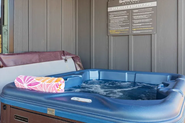 a room with a rug and a wooden floor