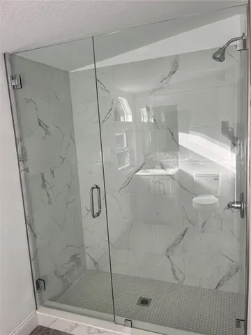 a view of a room that has a window