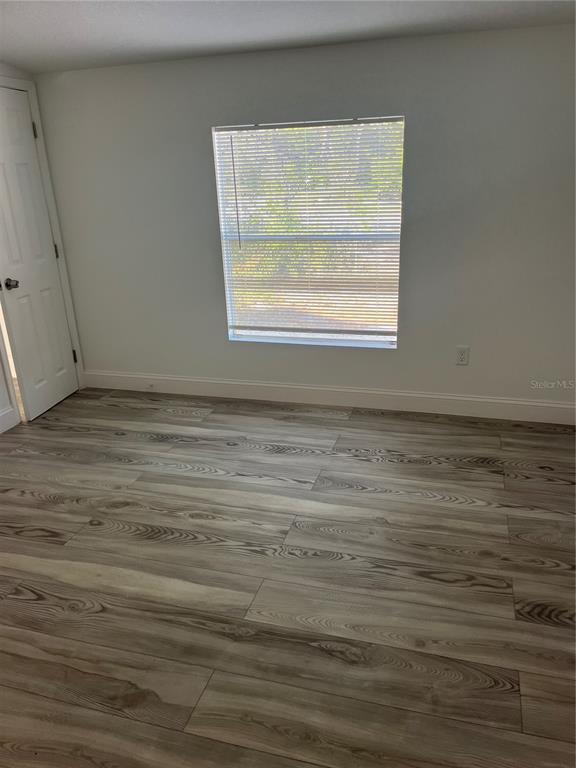 17300 Shady Hills Road Spring Hill, FL 34610 - Photo 14 of 17 a view of a room that has a window