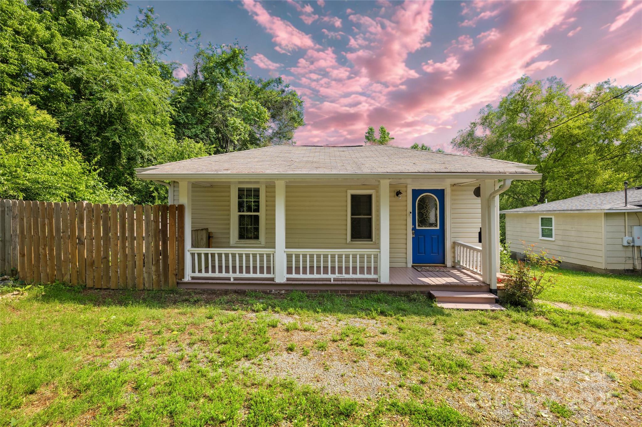 485 Lincoln Street Cramerton, NC 28032 - Photo 15 of 16 a front view of a house with a garden