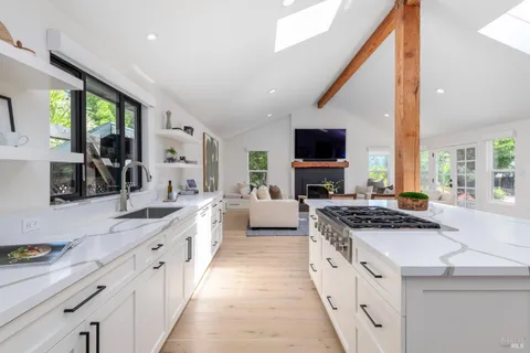 a view of a living room and bathroom