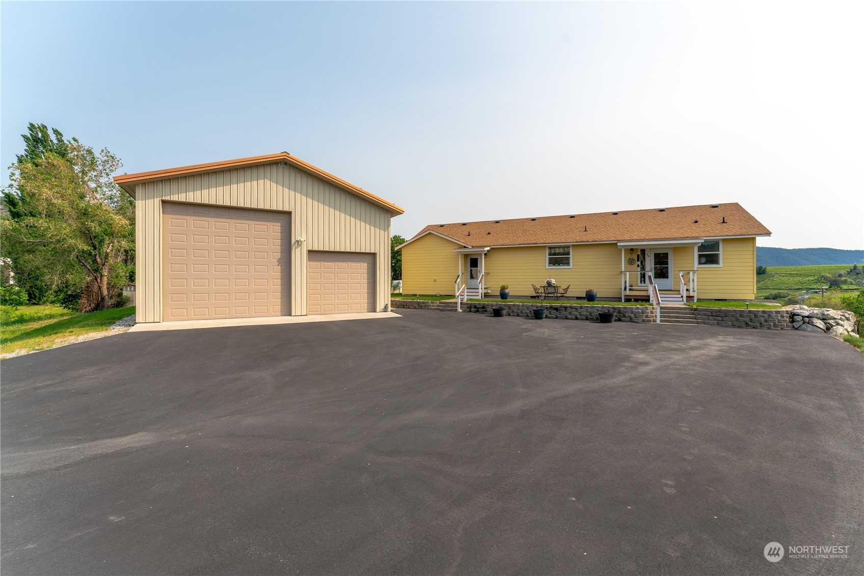 94 Shoemaker Road Manson, WA 98831 - Photo 20 of 37 a view of the house with a street
