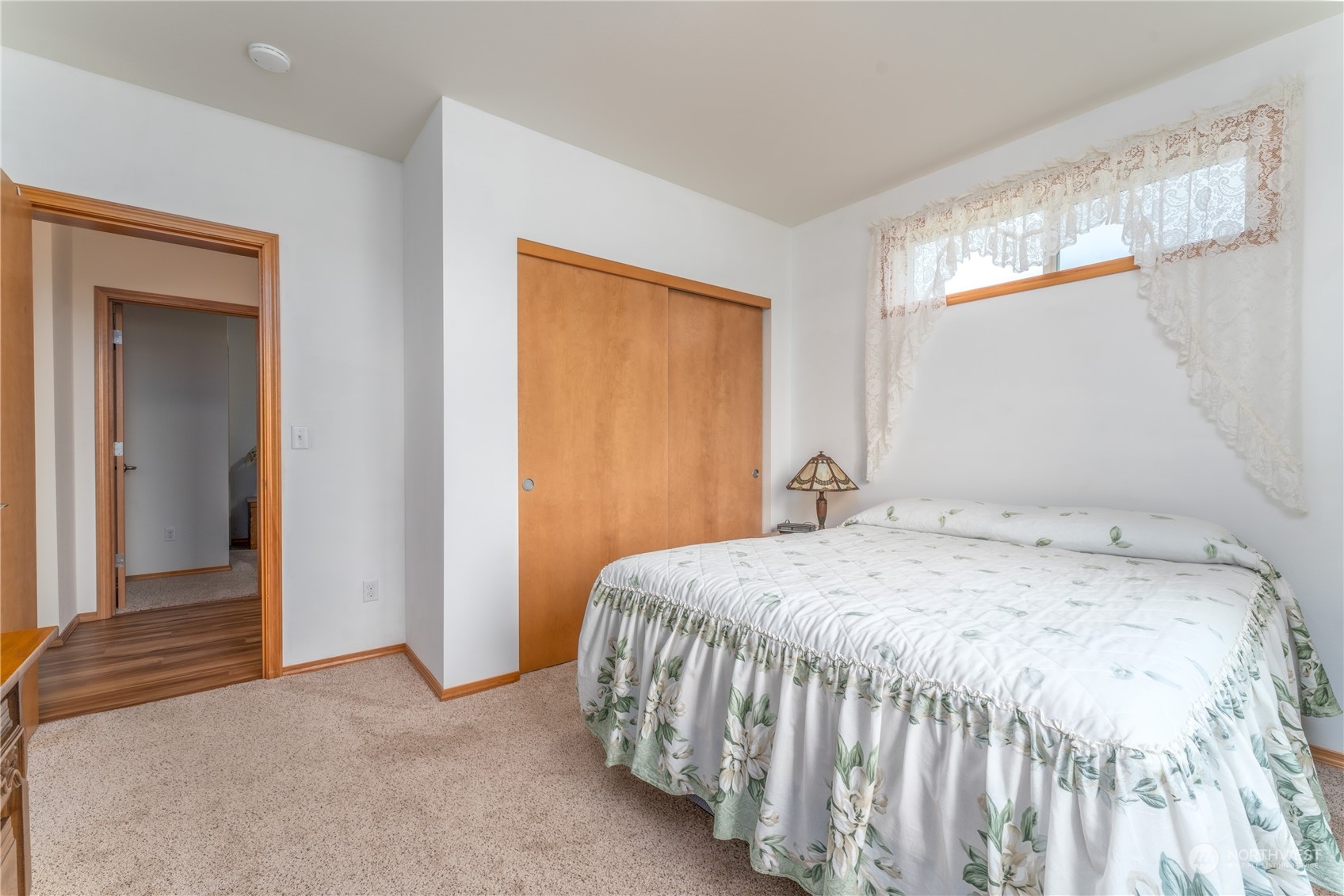 94 Shoemaker Road Manson, WA 98831 - Photo 33 of 37 a bedroom with a bed and a window