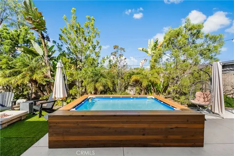 a view of a chairs and table in a patio